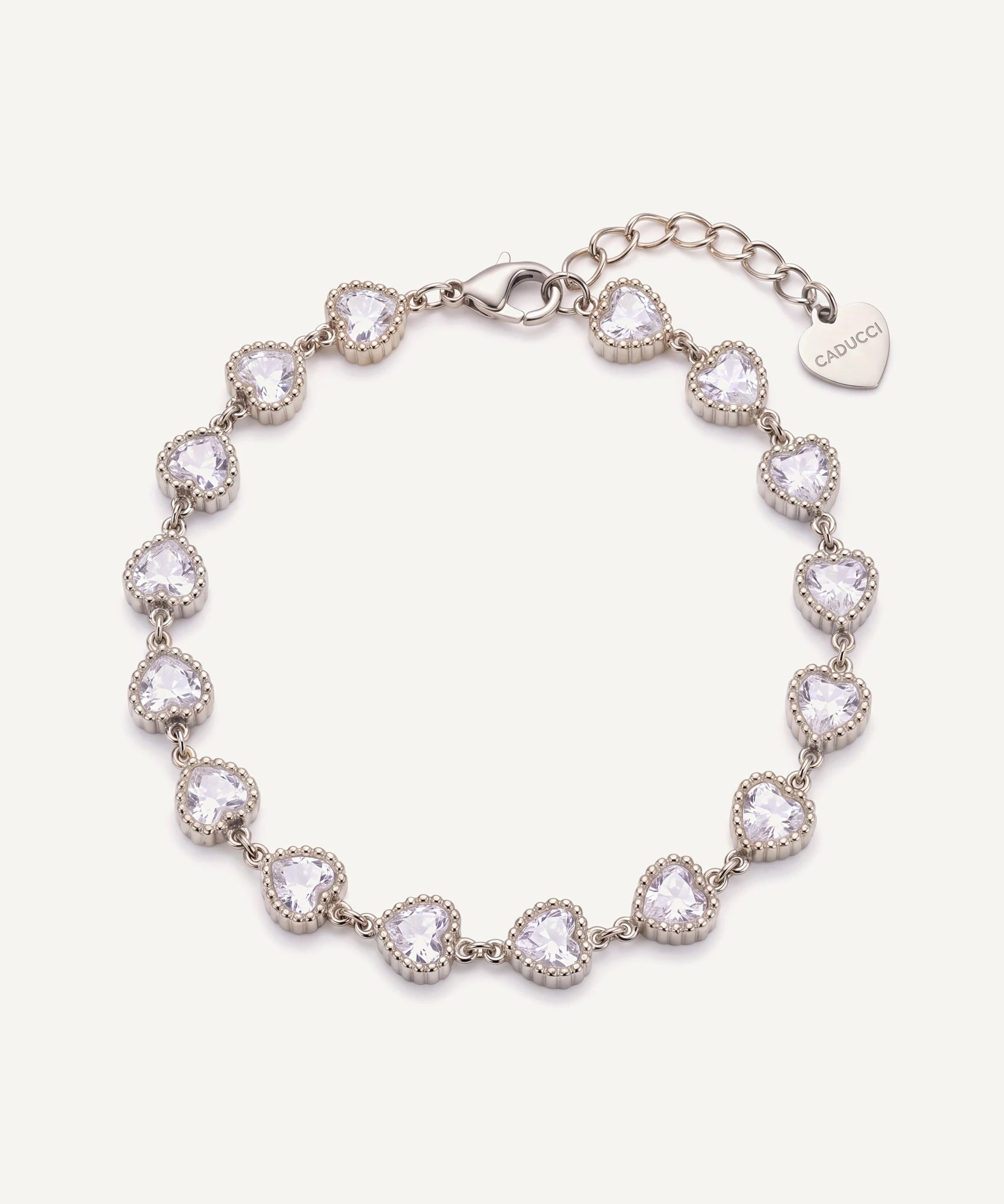 CADUCCI Amore Bracelet in silver with heart-cut crystals and a heart charm engraved with the CADUCCI logo