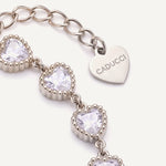 CADUCCI Amore Bracelet in silver, close-up of the heart charm engraved with the CADUCCI logo
