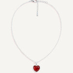 CADUCCI Amore Necklace in silver with a red heart pendant in a smooth bezel and a rectangular tag engraved with the CADUCCI logo