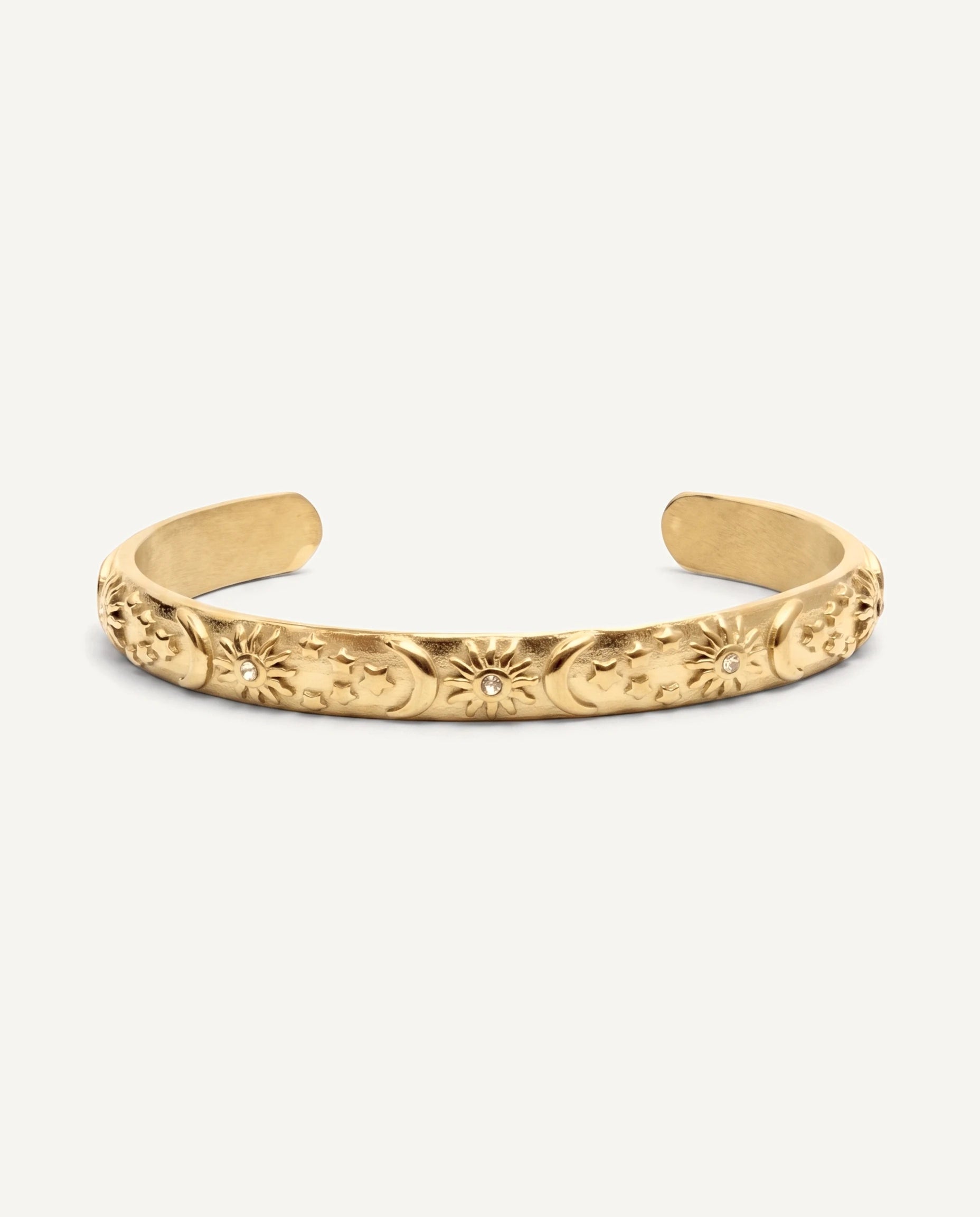 CADUCCI Belluno Bracelet in gold, an open cuff engraved with suns, moons and stars, front view