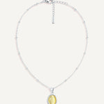 CADUCCI Capri Necklace in silver with an oval pale green cat's-eye pendant in a smooth bezel and a rectangular tag engraved with the CADUCCI logo