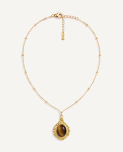 CADUCCI Luna Necklace in gold with a tiger's-eye pendant in a baroque gold frame and a rectangular tag engraved with the CADUCCI logo