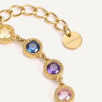 CADUCCI Roma Bracelet in gold, close-up of the disc tag engraved with the CADUCCI logo