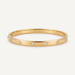 CADUCCI Venezia Bracelet in gold, slim hinged bangle with star-set crystals and the CADUCCI logo engraved inside
