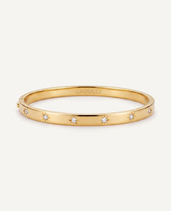 CADUCCI Venezia Bracelet in gold, slim hinged bangle with star-set crystals and the CADUCCI logo engraved inside