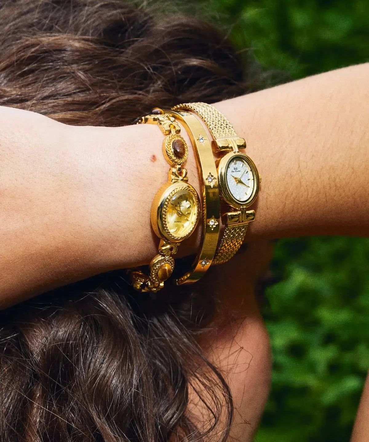 CADUCCI Venezia Bracelet in gold worn in a stack with a vintage gold watch