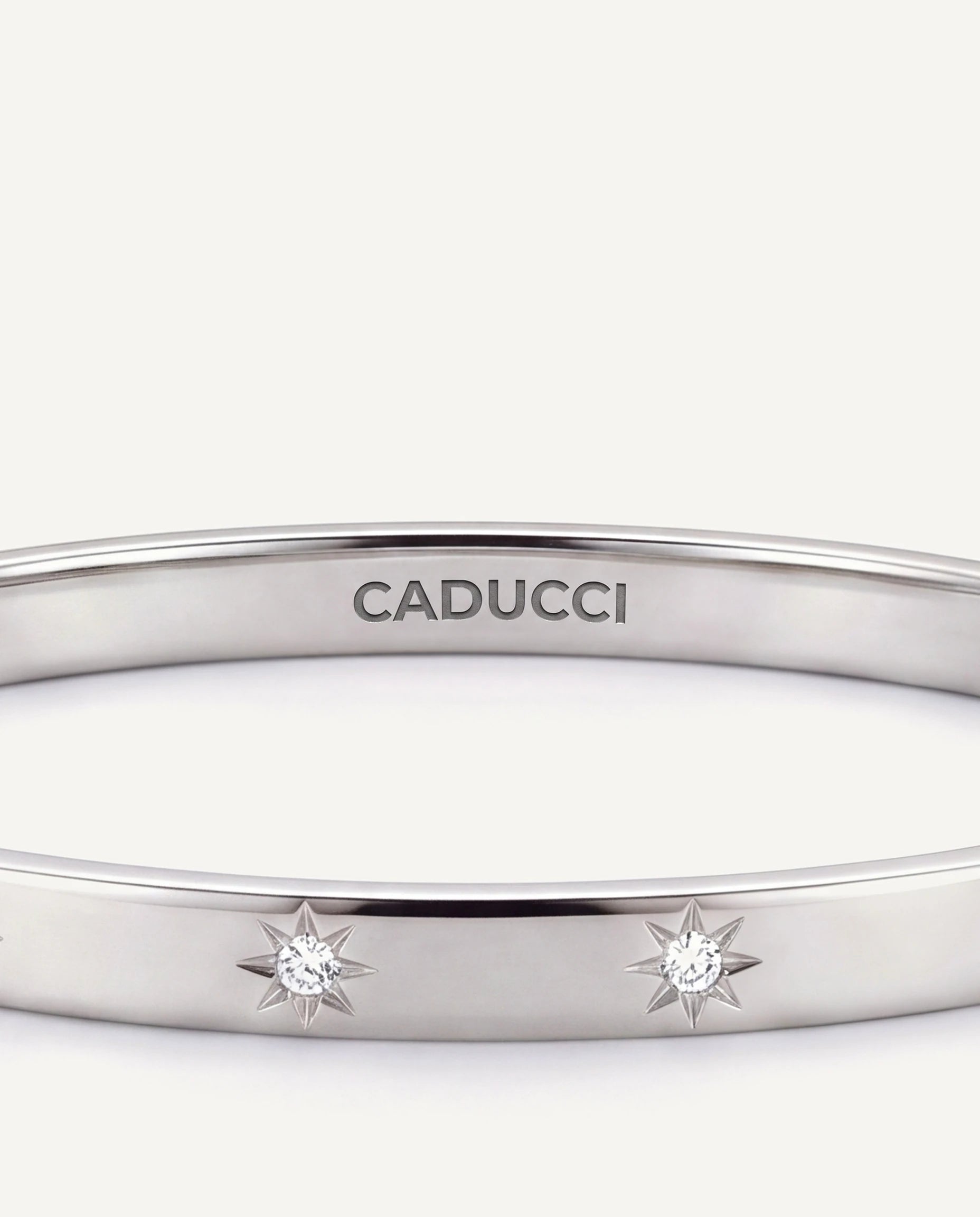 CADUCCI Venezia Bracelet in silver, close-up of the CADUCCI logo engraved inside the bangle