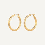 CADUCCI Vento Earrings in gold, twisted hoop earrings