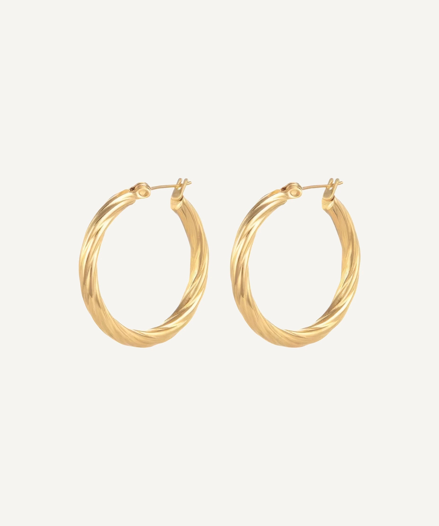 CADUCCI Vento Earrings in gold, twisted hoop earrings