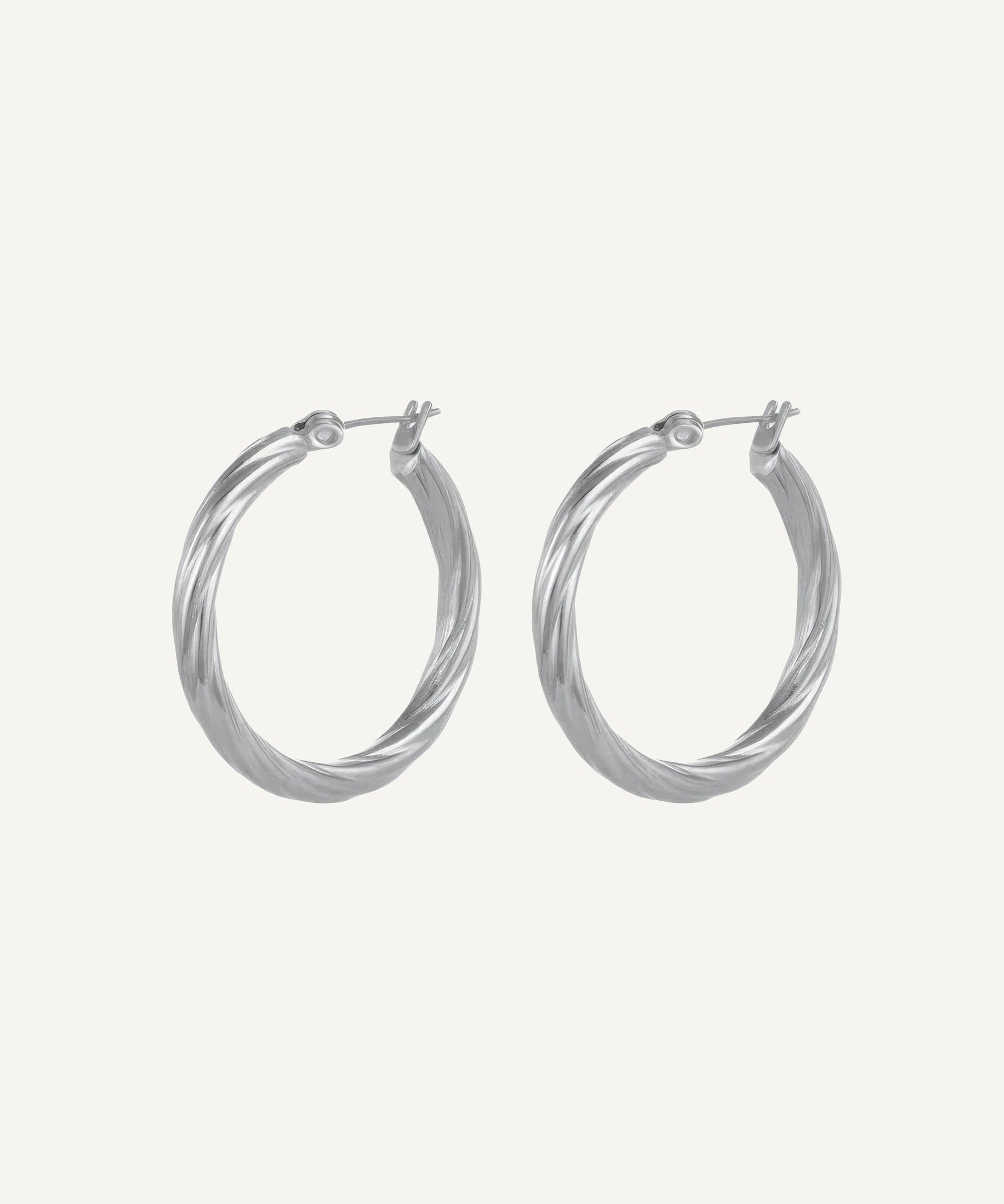 CADUCCI Vento Earrings in silver, twisted hoop earrings