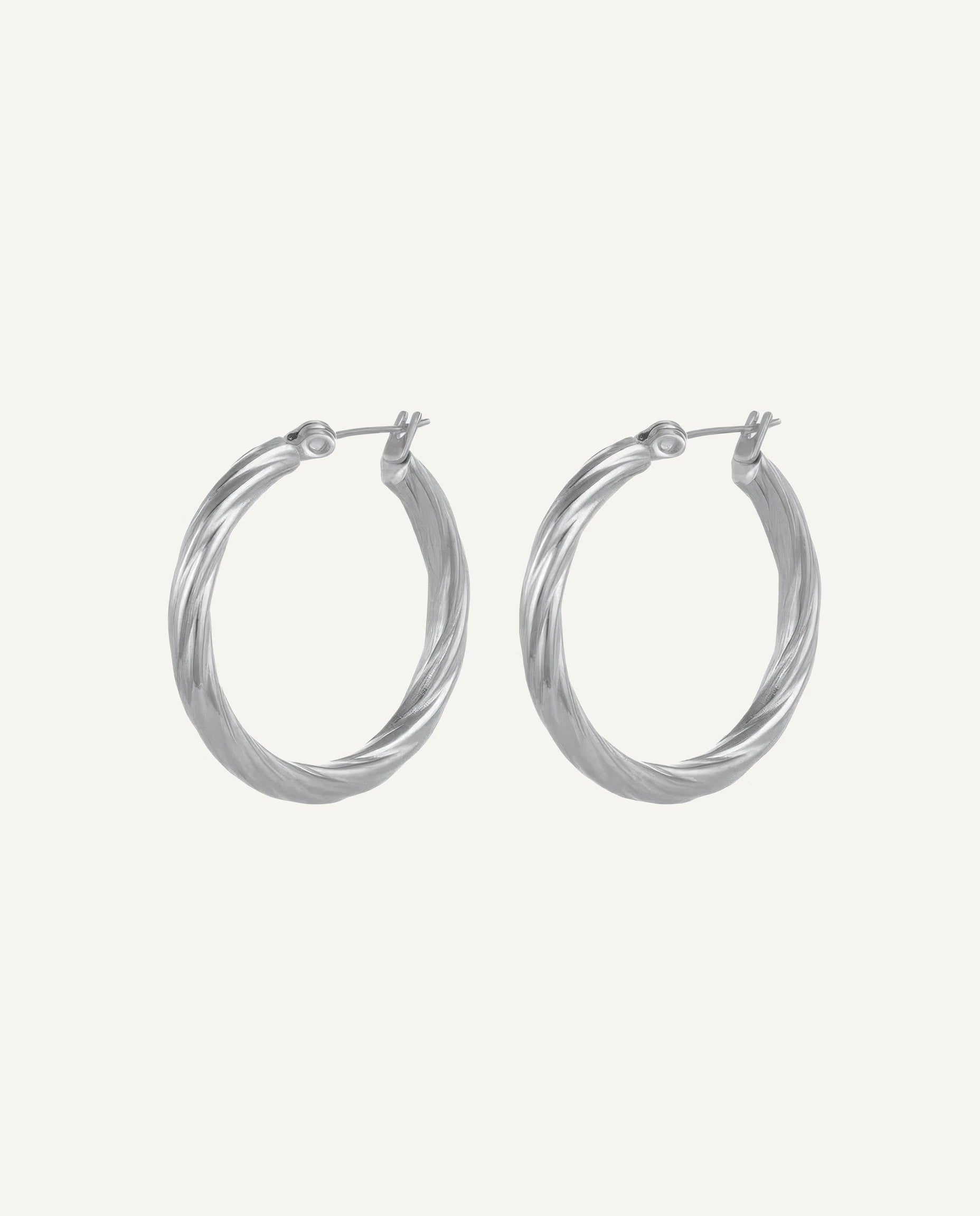 CADUCCI Vento Earrings in silver, twisted hoop earrings